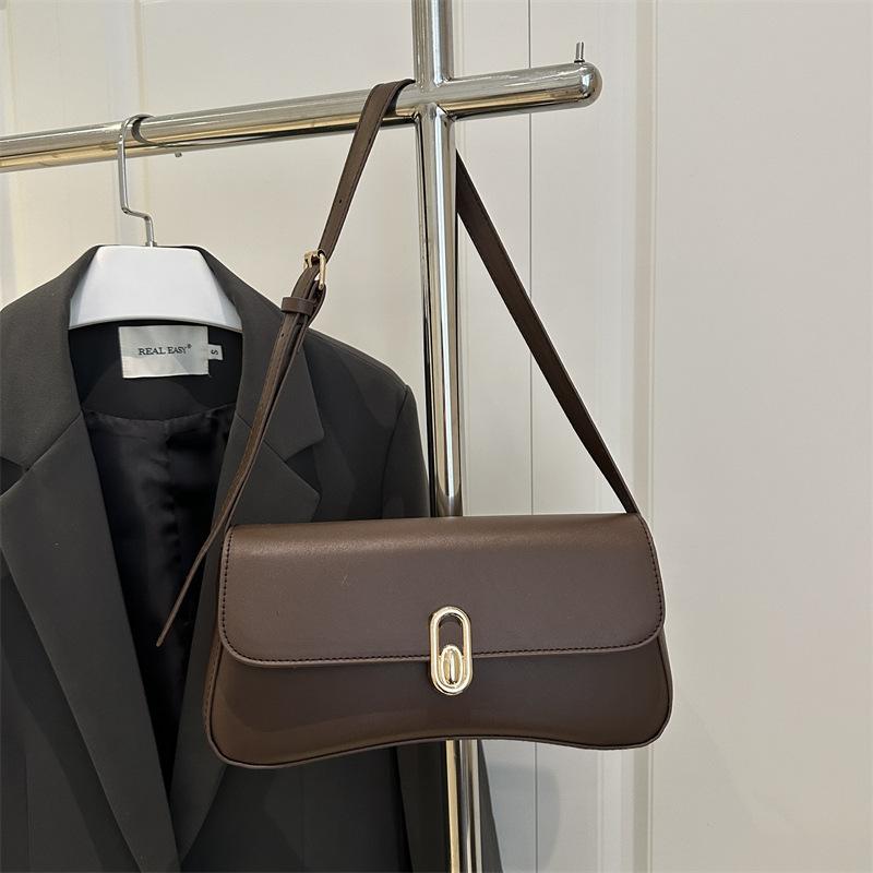 Ручная сумка-багет женская маленькая квадратная сумка французская индивидуальность трендовая 2025 новая замок модная ретро подмышечная зарубежный стиль на одно плечо