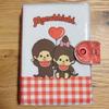 Used Monchhichi 6 hole binder sticker book