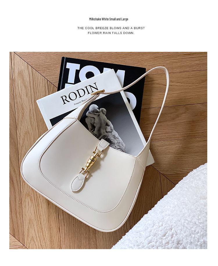 2025 Новый стиль Женская сумка на плечо из натуральной коровьей кожи - Повседневная, Простая, Стильная сумочка с замком.