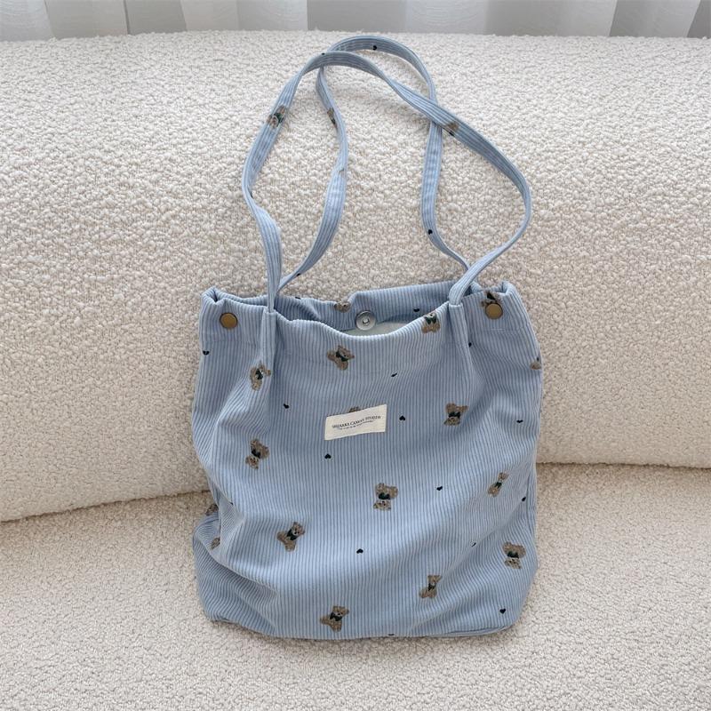 Copyright model, corduroy cartoon printed bear large-capacity portable shoulder bag, student armpit bag for class
