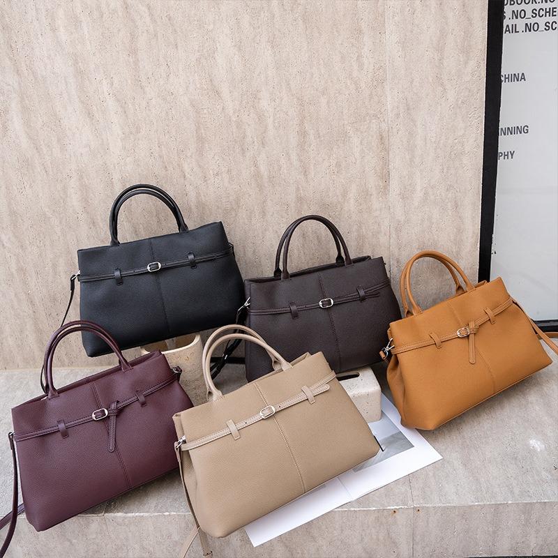 Винтажная кожаная женская сумка, новая вместительная сумка-платина для通勤, женская сумка через плечо, портативная сумка-тоут.