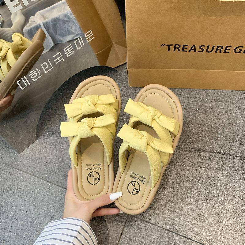 Sandals women's summer thick-bottomed versatile skirt 2025 wear new slippers one-word bow