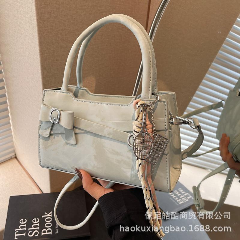 Премиальная сумка в иностранном стиле женская 2025 новая простая нишевая дизайнерская сумка через плечо, сумка-мессенджер, модная портативная сумка-тоут