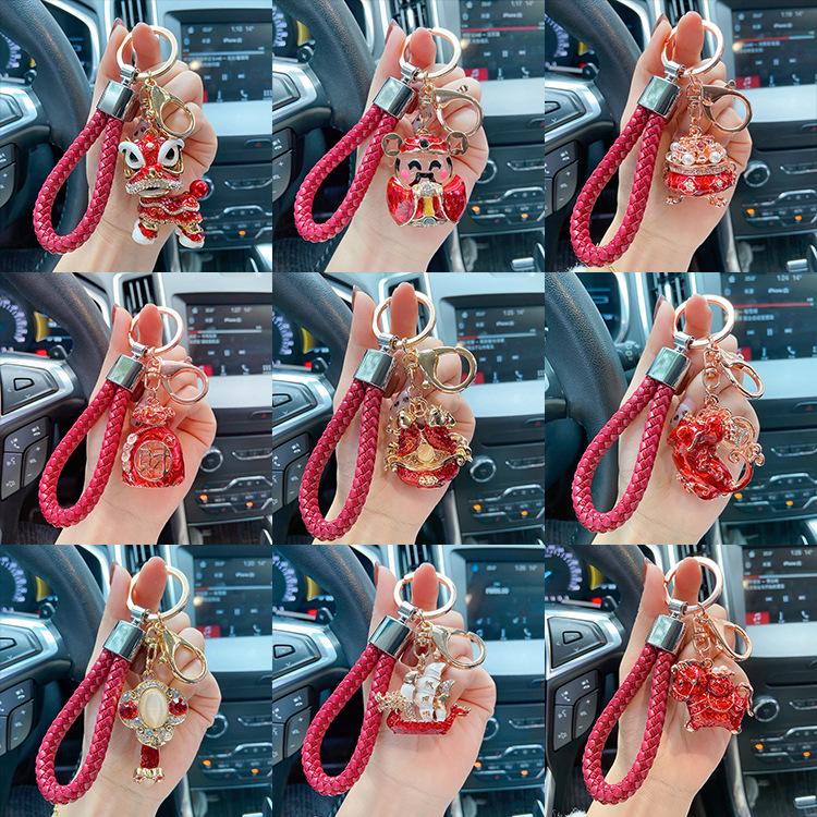 "2023 Red Series God of Wealth Keychain: Creative Money Bag for Car Keys, Annual Meeting Gift with Custom Logo Engraving"