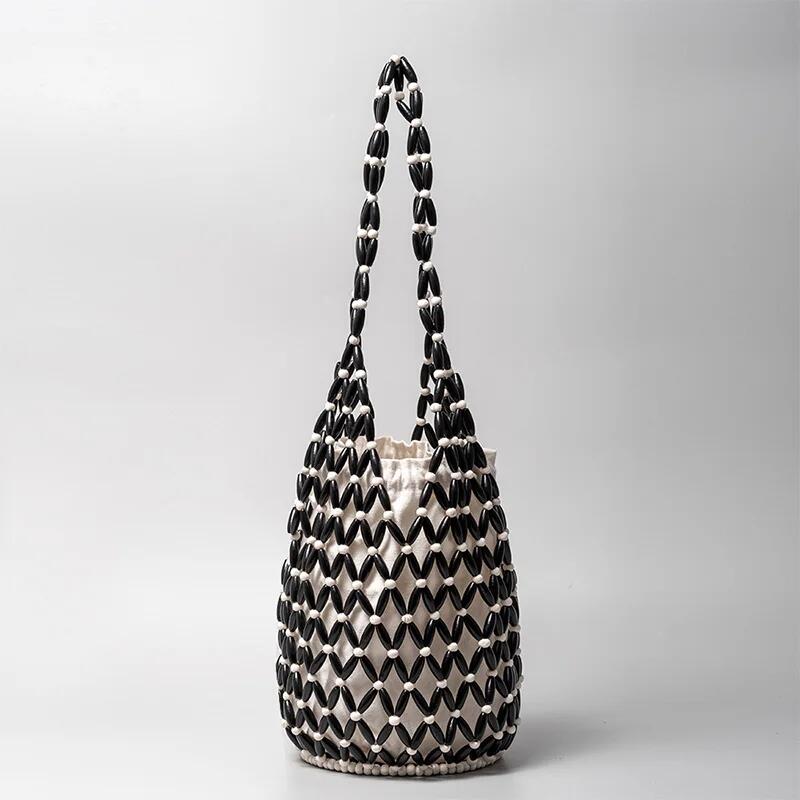 2025 New Design Summer Handmade Lady Wooden Bead Woven Tote Bag Hollow-out Shoulder Bag Travel Beach Underarm Bucket Bag Handbag
