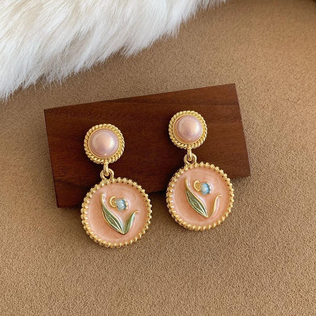 Модные серьги-подвески для женщин