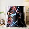 Characters duel with lightsabers on contrasting light and dark backgrounds. for all seasons blanket lunch break throw gift