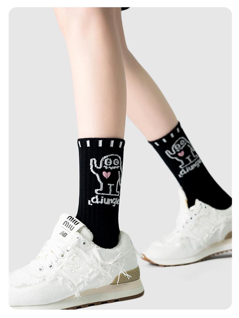 Women's Cute Graffiti Mid-Calf Cartoon Socks - Soft, Comfortable, and Trendy Black Cotton for Spring and Autumn.