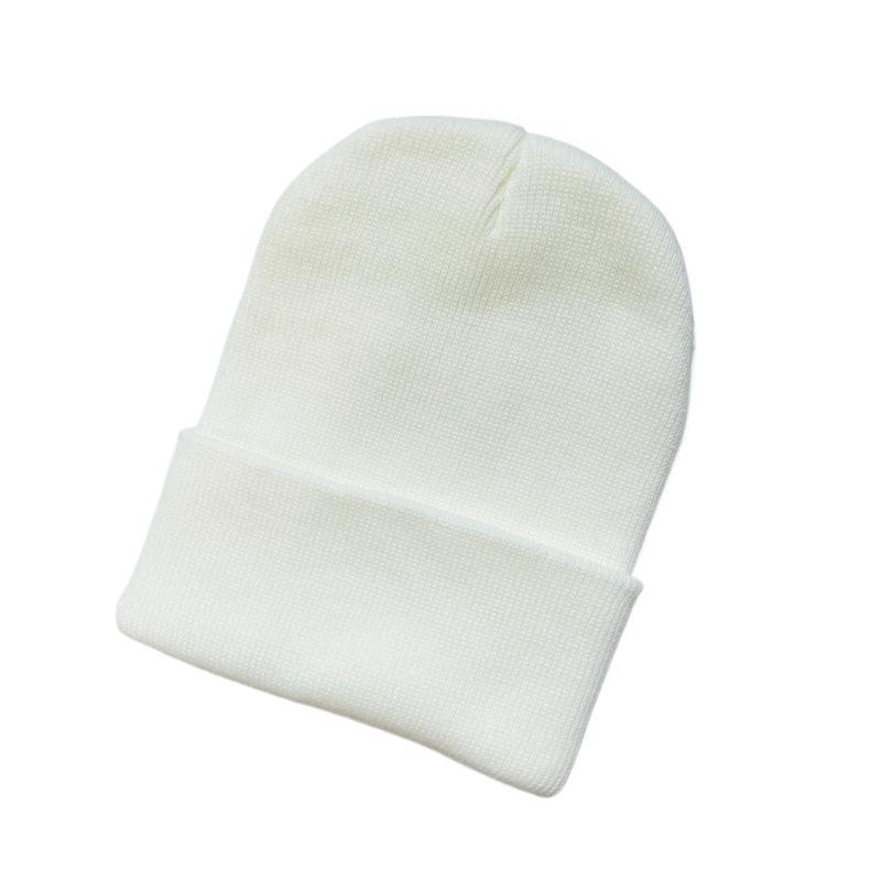 Уютные вязаные шерстяные шапки на осень и зиму - однотонные