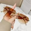 Frameless Sunglasses Female Design Sense Leopard Head Temple Sunglasses Male And Female Personality Polygon Trimming Gradual Change Glasses