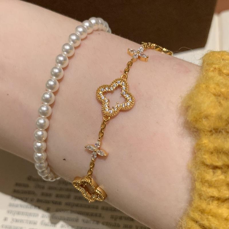 Light Luxury Retro Hollow Inlaid Four-Leaf Clover Bracelet Two-Color Super Flash Texture High-End Celebrity Hand Jewelry