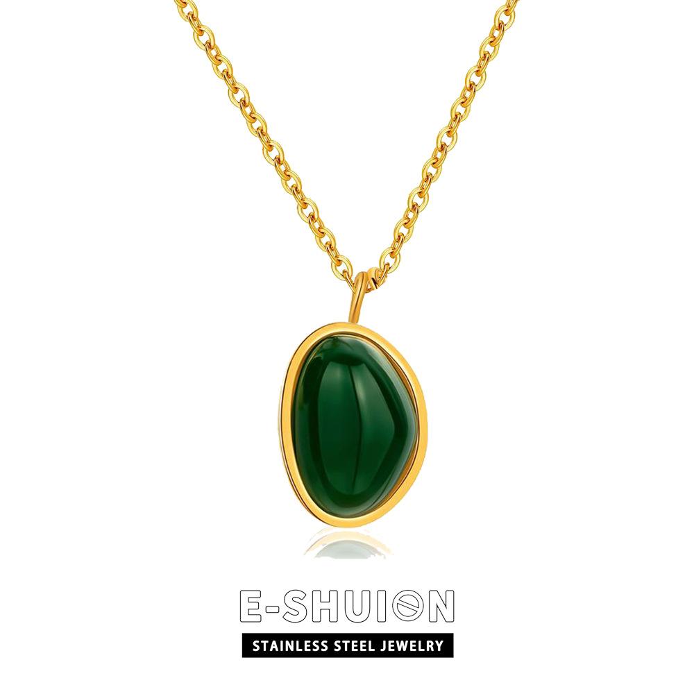 Luxury minimalist pendant necklace with shimmering emerald geometric design