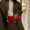 New French Design Leather Shoulder Handbag Women's High-End Party Red Bag Fashion Handheld Underarm Retro Baguette Bag