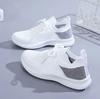 Женская обувь 2024 Весна Белый Новые дышащие спортивные сетчатые универсальные летние полые прогулочные летающие тканые нескользящие женские кроссовки