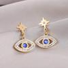 2023 New Tide Personality Versatile Demon Eye Earrings Retro Hong Kong Wind Ear Needle