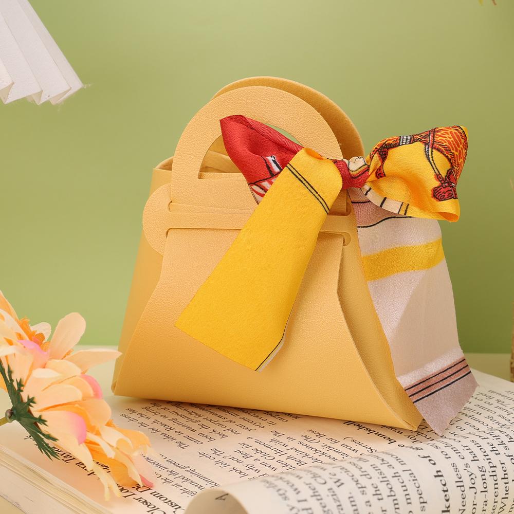 Роскошная кожаная мини-сумочка с бантом и лентой Подарочные пакеты Упаковочная коробка для конфет Распределительная сумка Свадебная вечеринка Подарочная коробка для конфет Кошелек