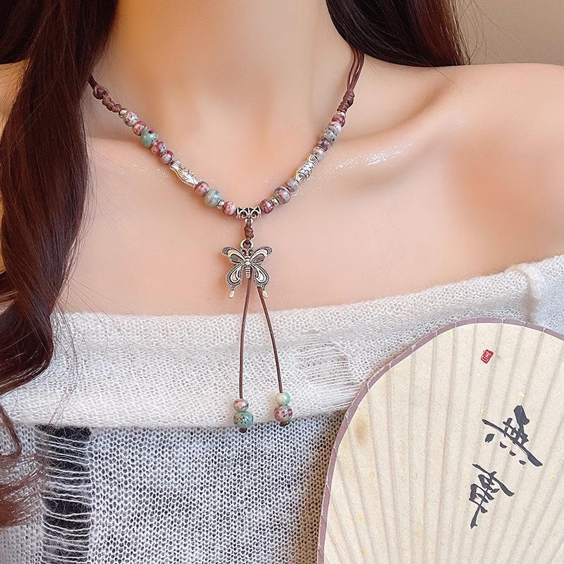 Керамическое ожерелье в виде бабочки в средневековом стиле с длинной цепочкой с кисточками на ключицу