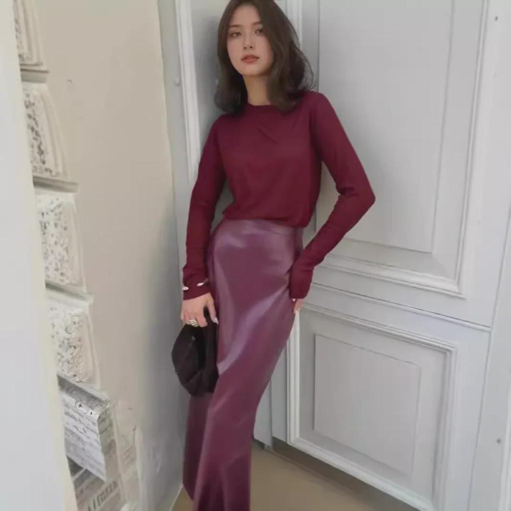 Осень 2024 года. Сексуальная кожаная юбка с высокой талией и разрезом.