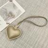 New niche leather peach hand rope pendant simple bag pendant car couple backpack accessories fashion Bag Charm