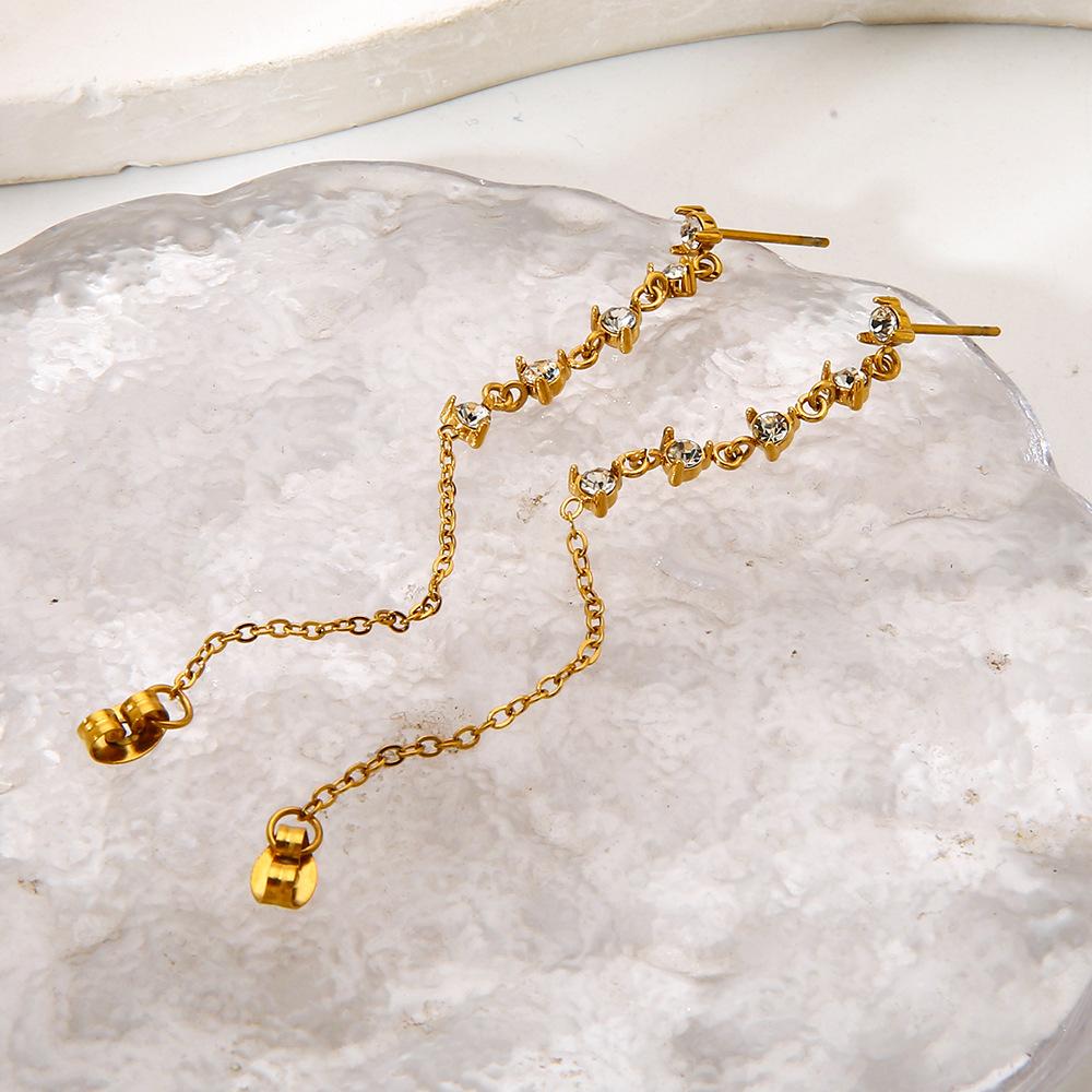 European and American personalized design sense plated 18K gold geometric zircon chain fringed stainless steel stud earrings front and rear wearing