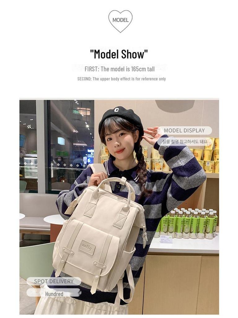 Stylish Mommy Bag: Hand-held Baby & Mother Backpack for Light Travel