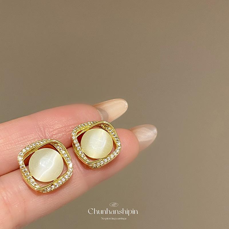 Square opal ear clips without holes, high-end light luxury zircon stud earrings, femininity retro painless mosquito coil disc earrings.