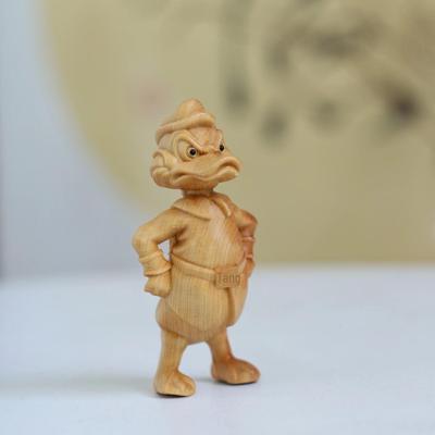 Животные зодиака Туя Вуд: Резные подвески с изображением Дональда Дака и Микки Мауса.