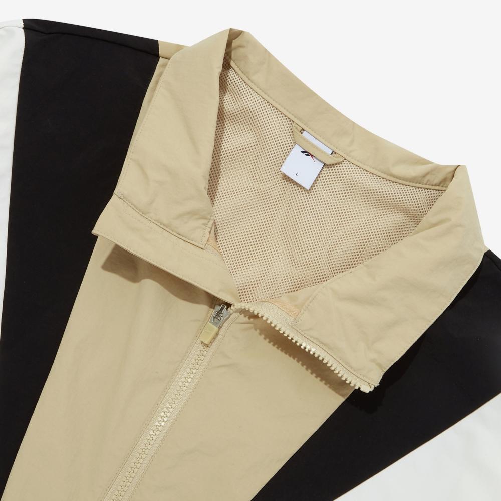 Reebok Ветровка с воротником-стойкой Twin Vector Color Block, удобная дышащая куртка на молнии, унисекс, бежевая REJU4EJ39I2