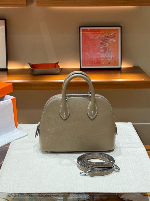 Мини-сумка через плечо из козьей кожи с зернистостью в виде боулинга