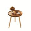 A Simple, Casual and Artistic Small Round Table Beside the Balcony Sofa, a Small Round Table and a Small Coffee Table