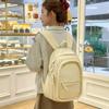 Schoolbag junior high school girls lightweight and simple spine protection to reduce the burden of versatile large-capacity schoolbag out of high 