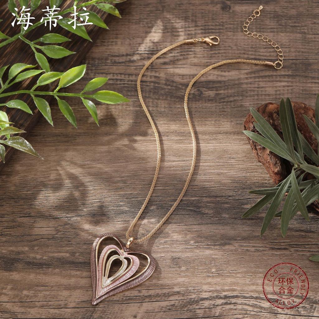 Luxury hot-selling enamel color hollow heart pendant, women's creative multi-layer hollow heart color oil necklace