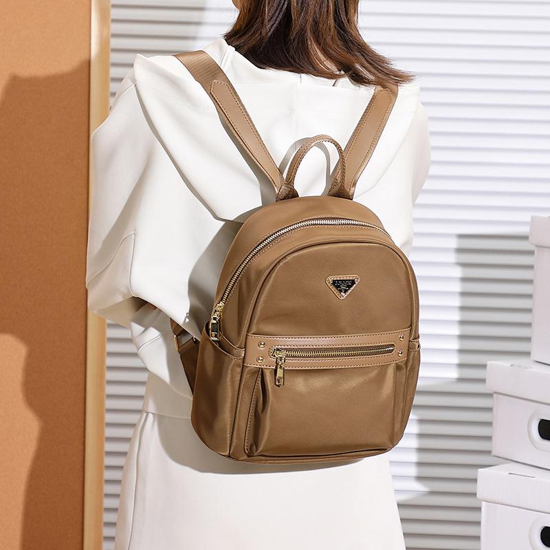 Корейская версия повседневного студенческого легкого рюкзака Новый универсальный и модный женский рюкзак Ткань Оксфорд Поездка для работы