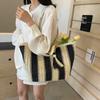 2025 Summer New Vertical Striped Straw Bag High-end Vacation Style Portable Woven Bag Casual Shoulder Beach Bag