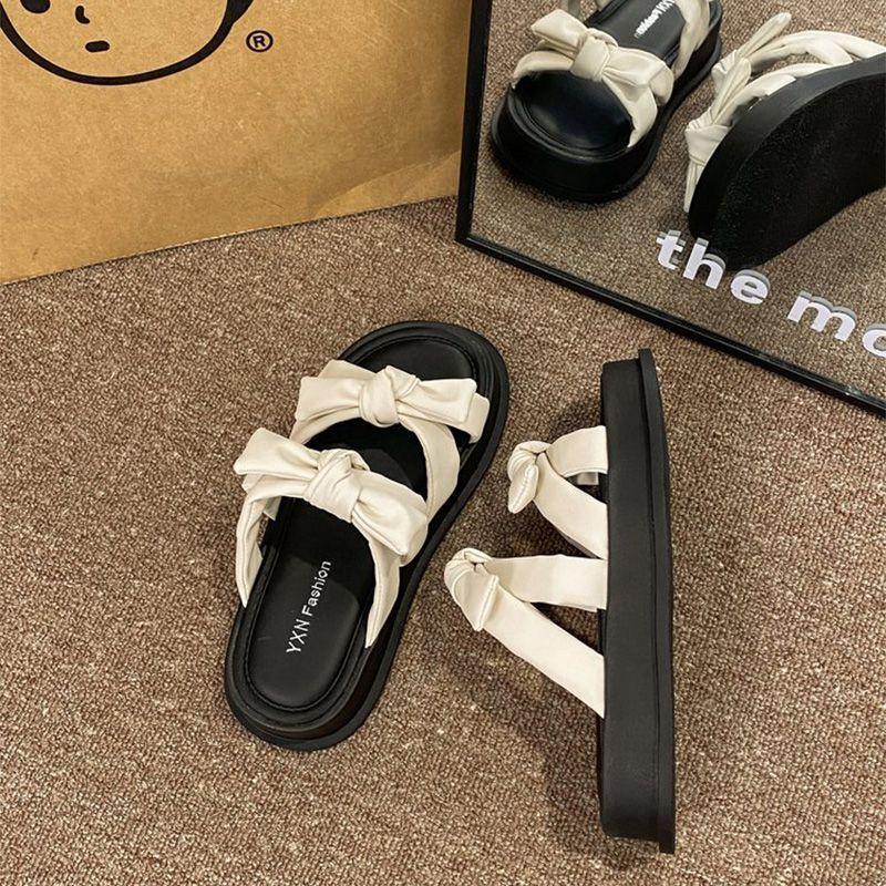 2024 summer new Internet celebrity explosion thick bottom heightening slippers women's outer wear skirt beach non-slip heightening cool slippers