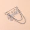 Temperament light luxury hollow leaf brooch, retro trend metal chain pin accessories