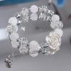 Chic Women's Bell Pendant Bracelet with Crystal Beaded White Flower Design for Outings