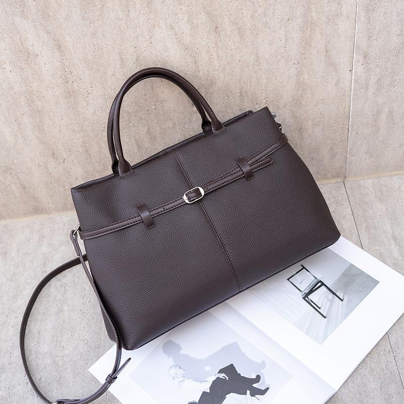 Винтажная кожаная женская сумка, новая вместительная сумка-платина для通勤, женская сумка через плечо, портативная сумка-тоут.