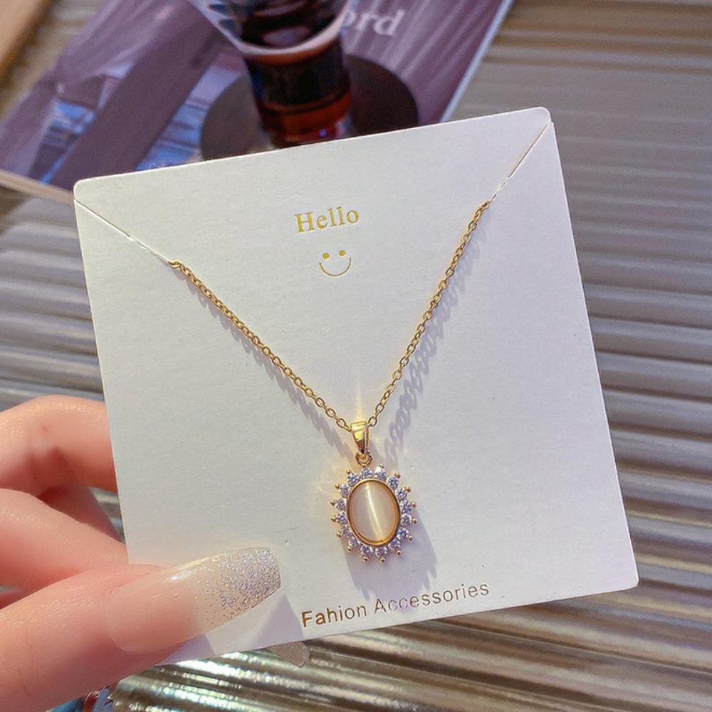 2026 Elegant Cat's Eye Stone Flower Necklace - Vintage Gold Plated Titanium Steel Zircon Halo Pendant for Women