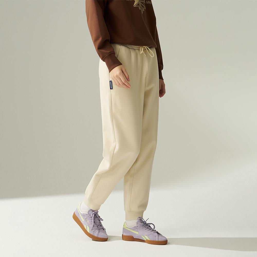 Reebok Повседневные универсальные удобные однотонные простые трикотажные спортивные брюки с манжетами женские плавки бежевого цвета 24FRM604WGM1