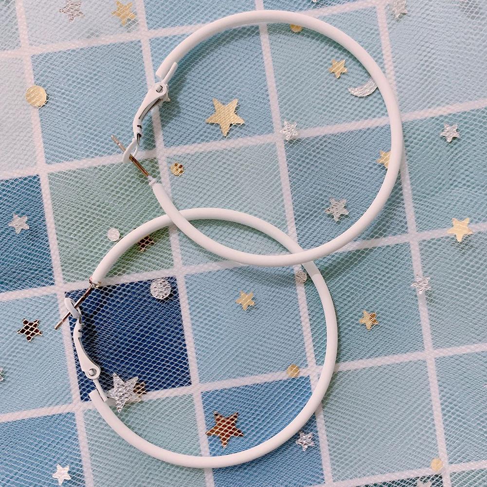 Женские большие серьги обручи