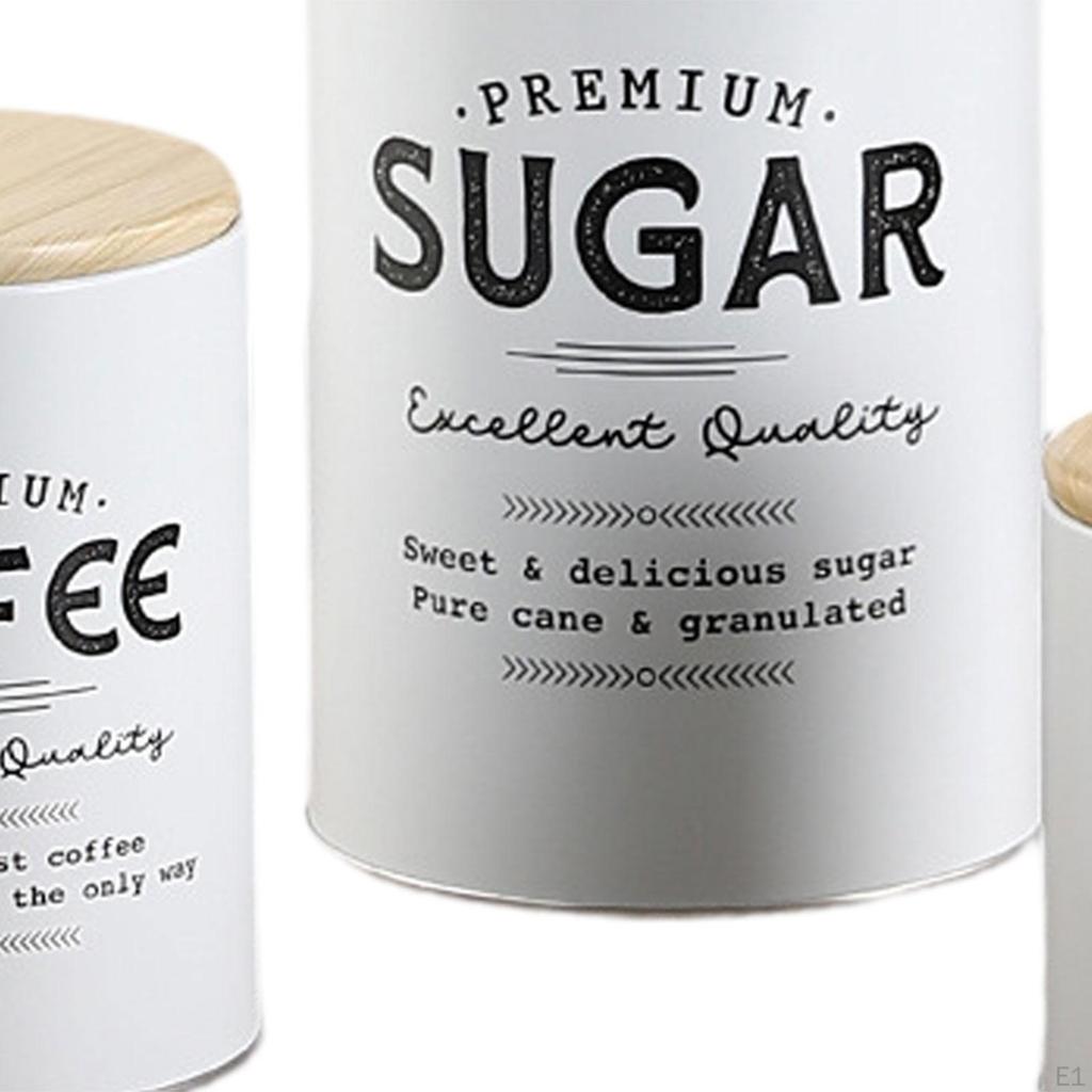 Композиция из 3 банок для хранения кофе, чая и сахара на кухонной столешнице