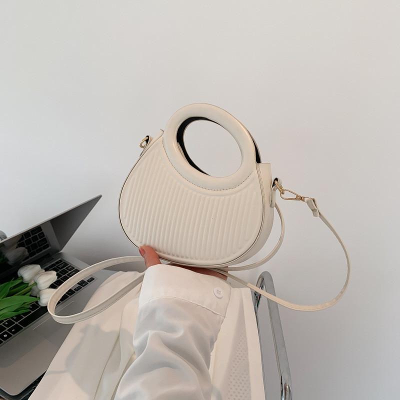 Fashionable Mid-size Round Shoulder Bag For Women In Street Style With Stylish Stitching