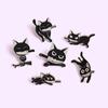 Игривая черная кошка-брошь с дизайном ножа – Уникальный животный аксессуар