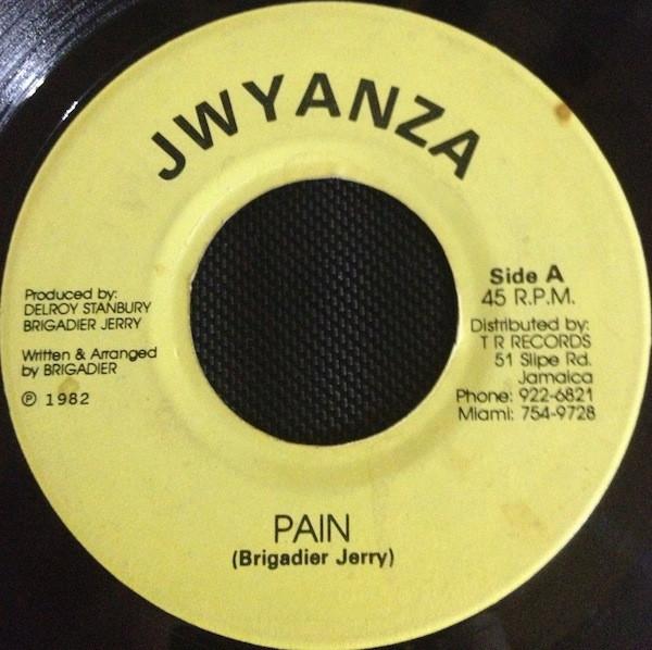 7-дюймовая пластинка BRIGADIER JERRY - Pain NONE Jwyanza 1982 Ямайка Регги, Ска и Даб Б/у