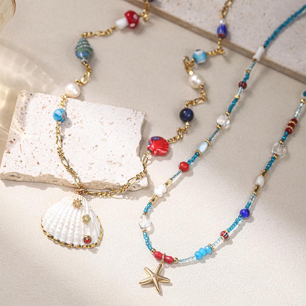 GEMCHIC Women's Ocean Style Shell Starfish Layered Necklace with Blue Beads and Pearl for Summer Vacation