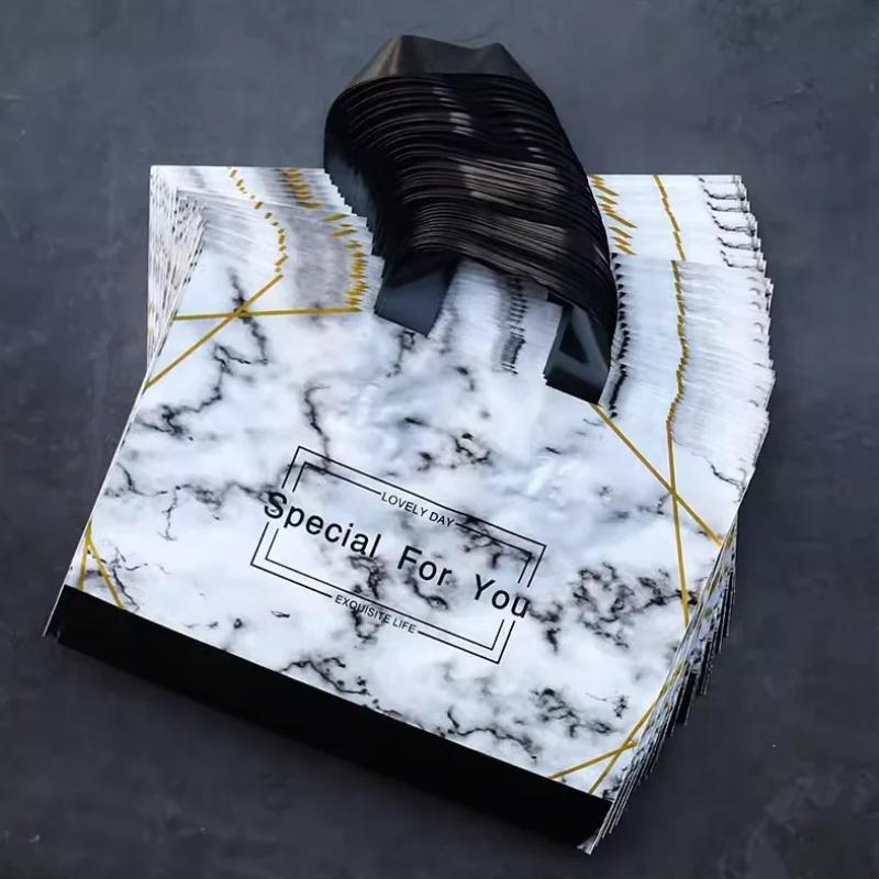 50 шт., новые модели, сумки толщиной 0,14 мм, прочная одежда, косметический подарок, сумки для покупок, эластичные, мощные, портативные, портативные упаковочные сумки