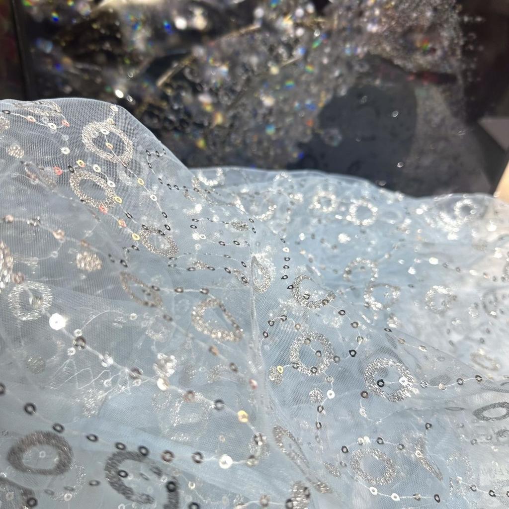 Embroidered sequin round patchwork net fabric suitable for wedding dresses formal gowns and designer clothing fabrics
