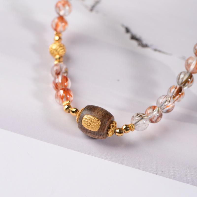 Женский браслет из черного золота с кристаллами Супер Семь, сандаловым деревом и шармом Пиксю, красный рутиловый кварц; Складываются для богатства и удачи.