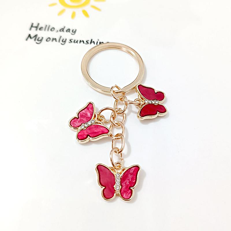 1 шт. Брелок из сплава Женские подарки Брелки Чехол для наушников Аксессуары Брелок-бабочка Брелоки для сумок Рюкзаки Разноцветный